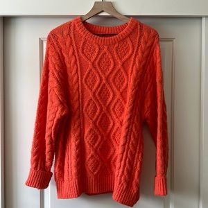 Bright orange Daily Drills sweater